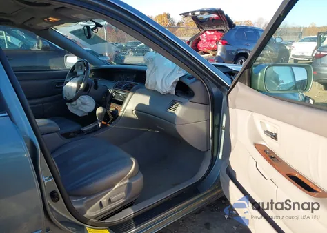 2004 Toyota Avalon Xls z USA, uszkodzony, nr VIN 4T1BF28B64U366418